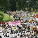 People march during the opening of the World Social Forum, Saturday, Jan. 20, 2007 in the Kenyan capital, Nairobi. More than 80,000 people gathered for an annual anti-capitalist conference in Kenya's capital on Saturday, hoping to network with other activists and protest global policies they say hurt the poor.